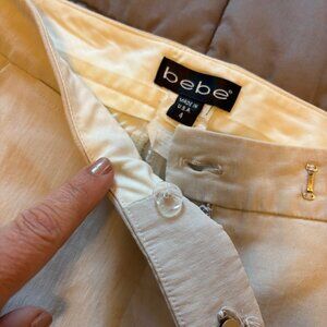Bebe womens khaki / cream slacks zipper ankle size 4